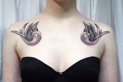itattooz-bird-tattoo-pic-on-chest-of-girl.jpg